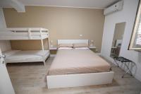 Chambre Quadruple avec Salle de Bains Privative