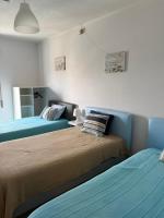 Basic Dreibettzimmer mit Gemeinschaftsbad