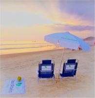 Casa d'Aroeira Residencial Boutique - Centro de Juqueí - Perto de Tudo - 2 quadras do Mar - Serviço de Praia - Roupa de Cama 600 fios algodão Egípcio - Tudo Novo - Estacionamento Interno - Cozinha - Consulte unidades com Ofurô Hidro e Cromoterapia - B&B Juqueí