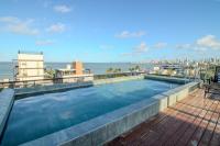 Flat a 50m da praia, com cozinha completa, estacionamento, recepção 24h, academia, lavanderia, Wi-Fi, mini mercado, Rooftop com piscina, churrasqueira e vista incrível - B&B João Pessoa