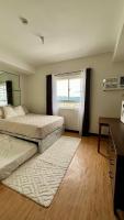 Stunning View w Pool & Gym Near Church& Ayala Mall - Chambres d'hôtes Pontud