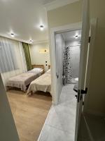 Tweepersoonskamer met 1 of 2 Bedden en Eigen Badkamer