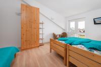Dreibettzimmer mit Meerblick