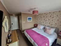 Deluxe Tweepersoonskamer met 1 of 2 Aparte Bedden en Uitzicht op de Oceaan