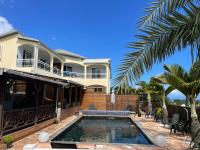 Spa Rooftop & Piscine chauffée- Villa des 4 Sens vue Océan - B&B Le Tampon