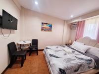 M1 Studio Apartment Transient House near SPMC Robinsons and SM Lanang - Chambres d’hôtes Davao
