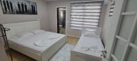 Vila Arbër 7 - Ferienwohnung Pogradec