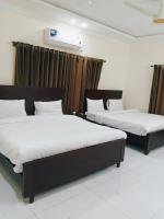 Chambre Deluxe Double ou Lits Jumeaux