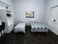 Basic Dreibettzimmer mit Gemeinschaftsbad