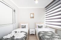 Three-Bedroom Apartment with Balcony