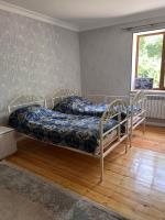 Tweepersoonskamer met 2 Aparte Bedden