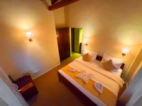 Kamer met Kingsize Bed en Uitzicht op de Bergen