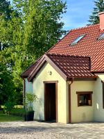 Mazurska Zagroda - Żabi Rechot - dom - stodoła - jacuzi - Bed and Breakfast Worliny