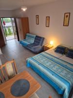 Quadruple Room with Private Bathroom