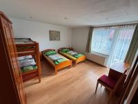 Vierbettzimmer mit Balkon