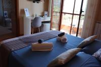 Kamer met Kingsize Bed en Uitzicht op Zee