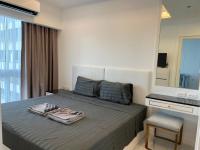 One-Bedroom Apartment with Balcony and City View