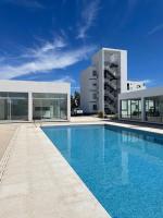 Departamento Nuevo- Piscina Techada- Climatizada - Confort y Calidad a metros del mar - Chambres d'hôtes Puerto Madryn