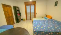 Chambre Quadruple avec Salle de Bains Commune