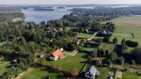 Domek Bajkowy Zakątek nad jeziorem Narie - B&B Bogaczewo