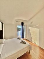 Two-Bedroom Apartment with Balcony and Sea View