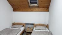 Doppel- oder Zweibettzimmer