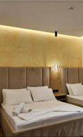 Chambre Double Deluxe (2 Adultes + 1 Enfant)