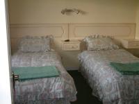 Tweepersoonskamer met 2 Aparte Bedden