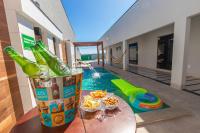 Sua Casa Perfeita c/ 4 Suítes e Piscina Aquecida - Ferienwohnung Caldas Novas