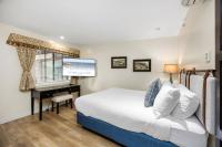 Zimmer mit Queensize-Bett und Gartenblick