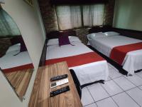 Chambre Deluxe avec 2 Lits Doubles