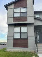 Cozy Inn new basemt wt sep entrance contains 1 bdrm and den for up to 4 guests - Ferienwohnung Airdrie