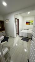 Ambiente amplo com quarto - B&B Petrolina