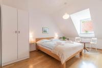 Chambre Lit Queen-Size avec Salle de Bains Commune