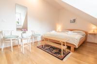 Chambre Lit Queen-Size avec Salle de Bains Commune