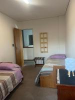 Doppel-/Zweibettzimmer mit Balkon
