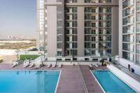 Vacationer Holiday Homes I Elegant 1 Bedroom l Modern Finishes l Meydan - Chambres d'hôtes Dubaï
