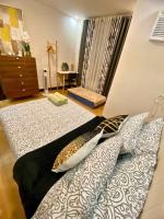 Neat and Fresh Fast Wifi with Pay parking PH Arena condo - B&B Marilao