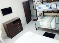 Camera Familiare con Bagno in Comune