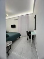 Camera Quadrupla Luxury