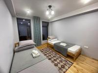 Chambre Triple – Vue sur Montagne