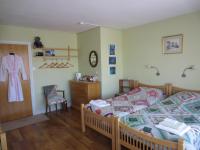 Chambre Quadruple avec Douche