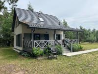 Młyńska Chata - drewniany, całoroczny dom w sosnowym lesie - B&B Czarny Młyn