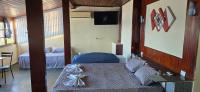 Kamer met Kingsize Bed en Uitzicht op Zee