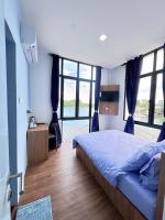 Tweepersoonskamer met 1 of 2 Bedden en Uitzicht op het Meer.