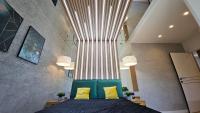One-Bedroom Apartment with Balcony and City View