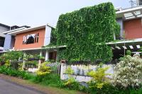 Midtown Meadow - Chambres d’hôtes Kozhikode