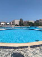 Chalet two rooms on the North Coast Misr lel tameer village - Chambres d'hôtes Qaryat Shurūq