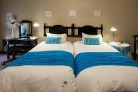 Camera Deluxe Doppia con Letti Singoli