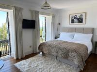 Habitación Doble Deluxe con balcón y vistas al mar